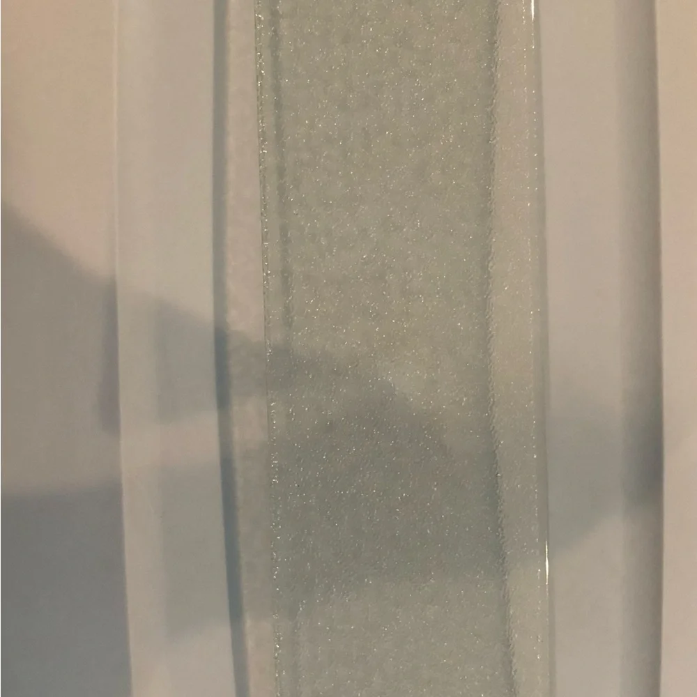 12 3/4 12/16 in long x 3 3/4 12/16 in deep Tempered glass Shelf a vanity cabinet